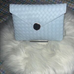 Sophisticated Blue Quilted Makeup Bag with Flap Design